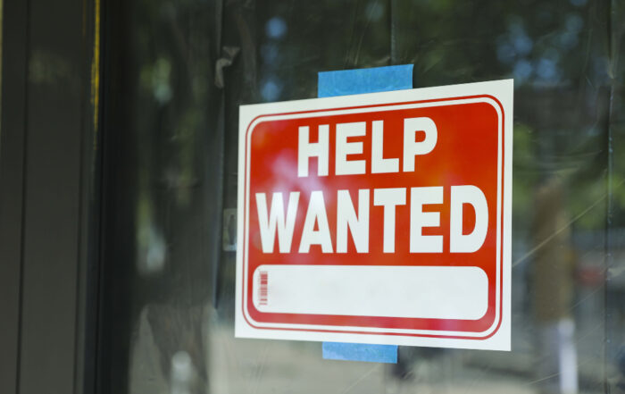 Help wanted sign in window